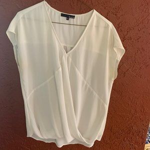 Airy white blouse with front overlap detail